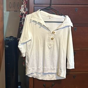 A cute button up top with a wide collar, and the base is white